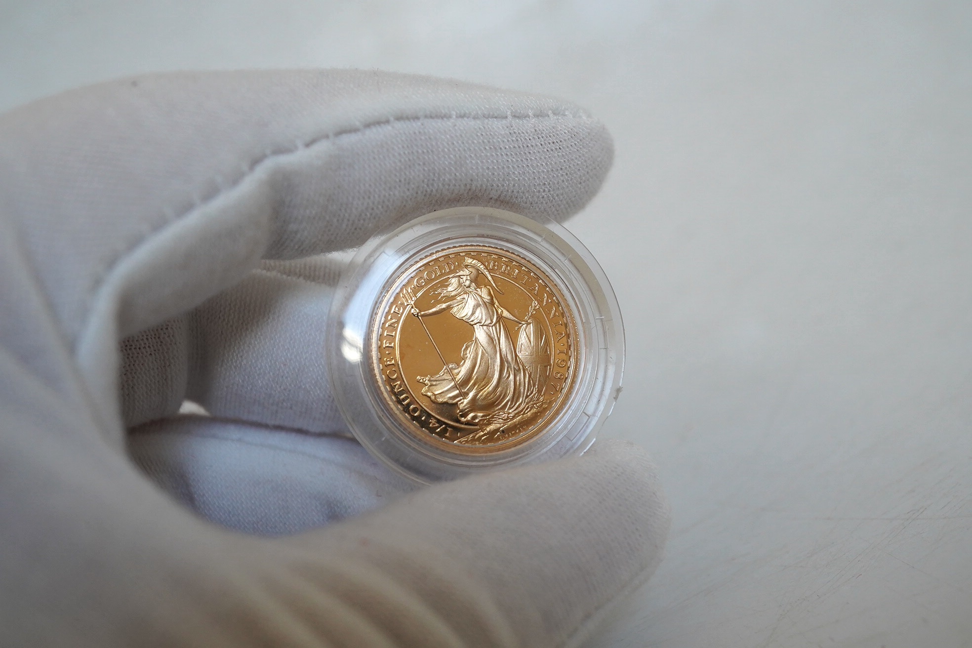 British gold coins, 1987 Royal Mint Britannia 1/4 oz. proof gold £25 coin, in case of issue with certificate